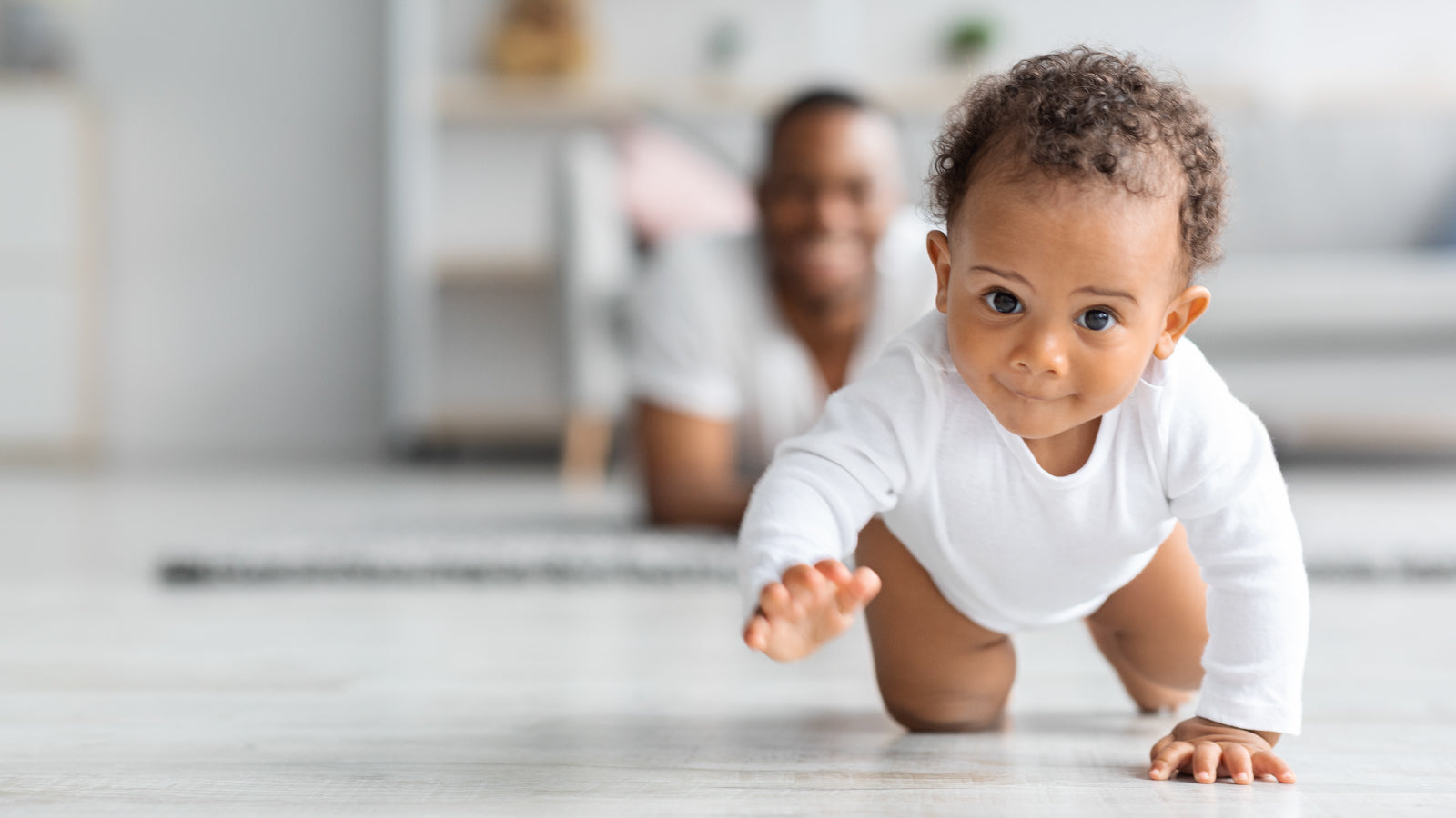 Your Baby Is on the Move: A Parent’s Guide to Crawling, Walking and Home Safety