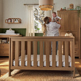 CuddleCo Burford 3 Piece Nursery Furniture Set with Cot Bed, Dresser & Wardrobe - Oak