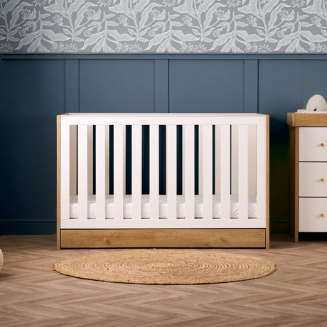 Obaby Nika 3 Piece Nursery Furniture Set with Cot Bed, Under Drawer, Dresser and Wardrobe - Oak & White