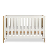 Obaby Nika 3 Piece Nursery Furniture Set with Cot Bed, Under Drawer, Dresser and Wardrobe - Oak & White